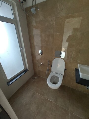 Bathroom in 1 BHK Apartment at Omkar Signet, Malad East – for Rent