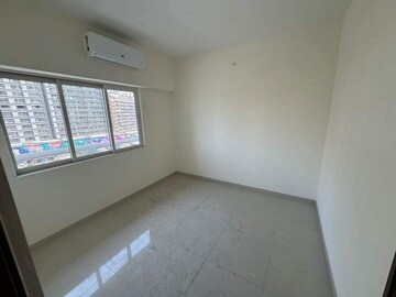 Room in 2 BHK Apartment at Omkar Signet, Malad East – for Rent