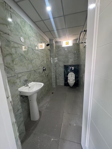 Bathroom in 2 BHK Builder Floor at Sahastradhara Road – for Sale