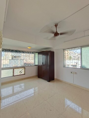 Bedroom in 2 BHK Apartment at Bhagwati CHS, Andheri West – for Rent