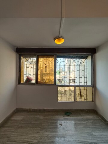 Room in 2 BHK Apartment at Bhagwati CHS, Andheri West – for Rent