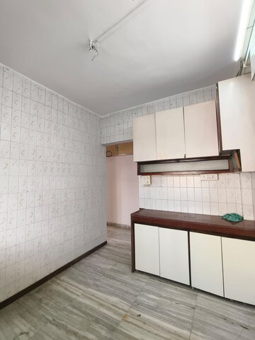 Kitchen in 2 BHK Apartment at Bhagwati CHS, Andheri West – for Rent