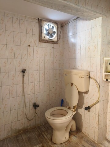 Bathroom in 2 BHK Apartment at Bhagwati CHS, Andheri West – for Rent