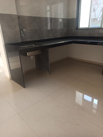 Kitchen in 2 BHK Apartment at Wadegaon – for Sale
