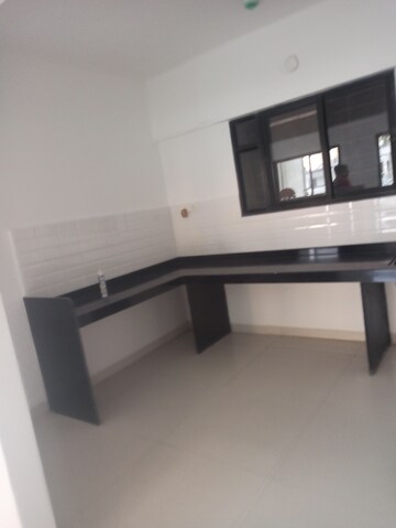 Kitchen in 2 BHK Apartment at Wadegaon – for Sale