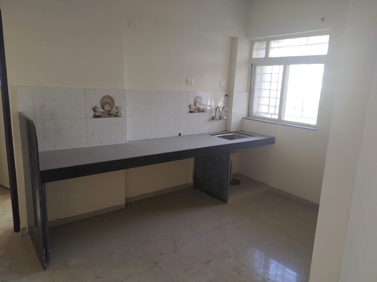 Kitchen, supertech-defence-colony-phase-l 2 Bedroom 750 Sq.Ft. Apartment In Wagholi Pune 8372009