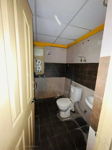 Bathroom in 2 BHK Apartment at Gulmohur Garden, Raj Nagar Extension – for Rent