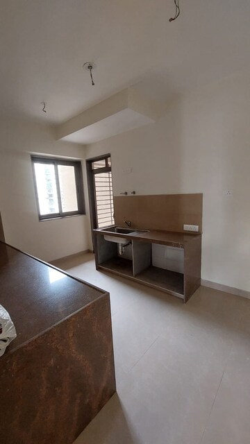 Kitchen in 4 BHK Apartment at Bhimjyani Verraton, Manpada – for Rent