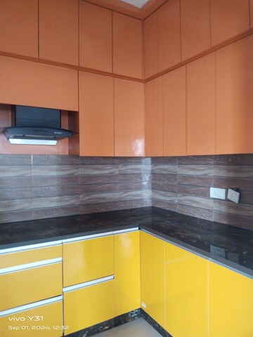 Kitchen in 2 BHK Apartment at Mahagun Mywoods, Sector 16c Greater Noida – for Rent