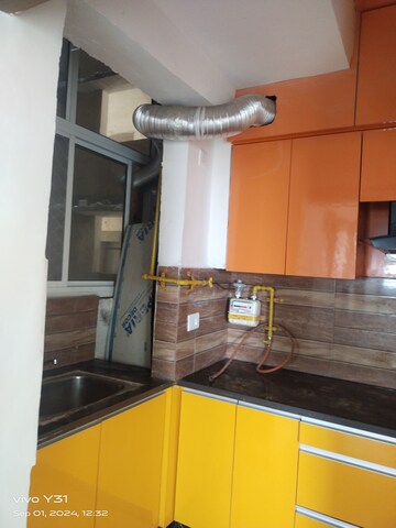 Kitchen in 2 BHK Apartment at Mahagun Mywoods, Sector 16c Greater Noida – for Rent