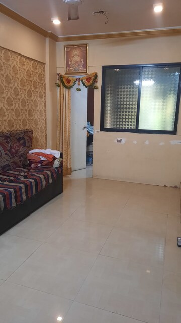 Living Room in 1 BHK Apartment at Seawoods – for Sale