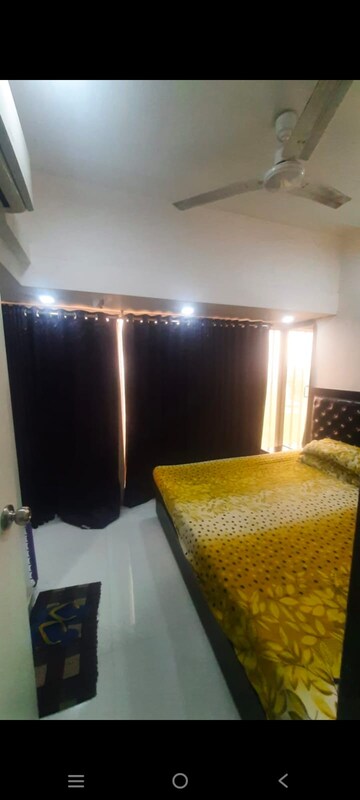 Living Room in Studio Apartment at Royal Palms, Goregaon East – for Rent
