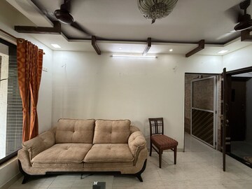 Living Room in 2 BHK Apartment at Seawoods – for Sale