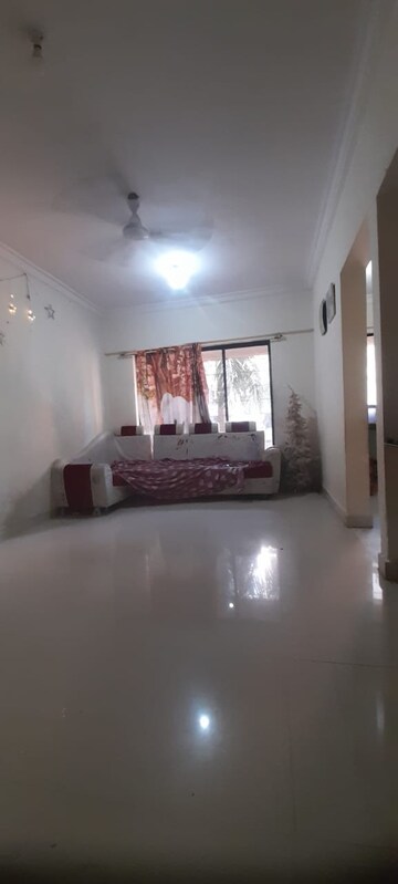 Living Room in 2 BHK Apartment at Sheth Irene, Malad West – for Rent