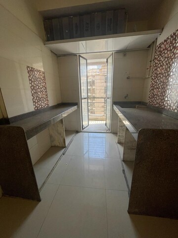 Kitchen in 2 BHK Apartment at Ravi Gaurav Excellency, Mira Road – for Sale