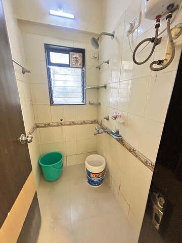 Bathroom in 1 BHK Apartment at Mantri Park, Goregaon East – for Rent