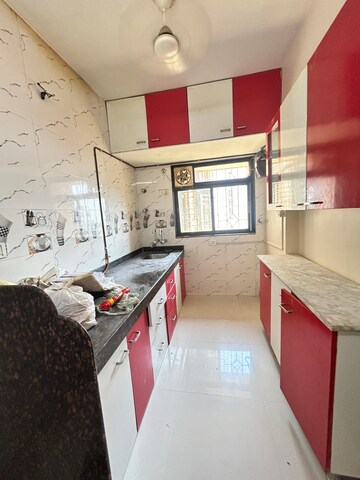 Kitchen in 1 BHK Apartment at Mantri Park, Goregaon East – for Rent