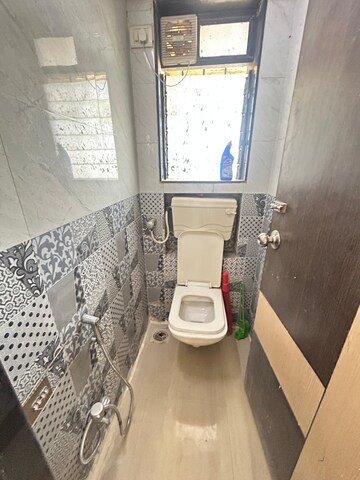 Bathroom in 1 BHK Apartment at Mantri Park, Goregaon East – for Rent