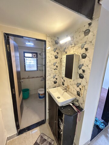 Bathroom in 1 BHK Apartment at Mantri Park, Goregaon East – for Rent