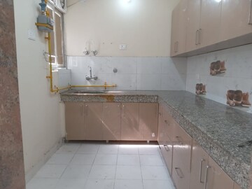 Kitchen in 2 BHK Apartment at Raj Nagar Extension – for Rent