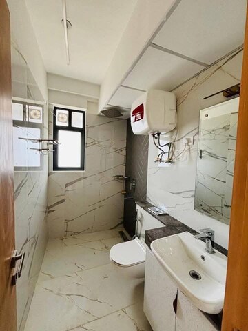 Bathroom in 3 BHK Apartment at Shapoorji Pallonji Joyville Phase 3, Sector 102 – for Rent