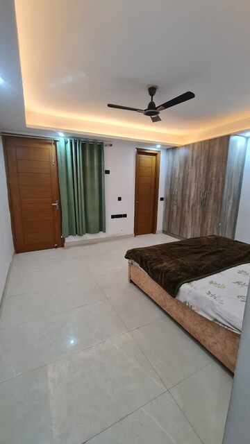 Bedroom in 3 BHK Builder Floor at Freedom Fighters Enclave – for Rent