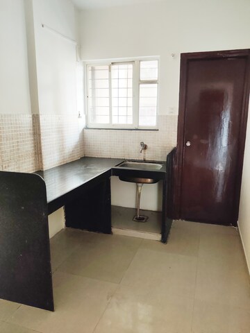 Kitchen in 1 BHK Apartment at Jalan Aura County Pune, Wagholi – for Rent