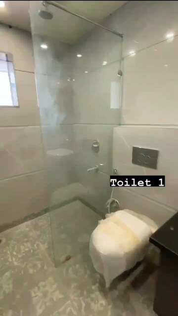 Bathroom in 4 BHK Apartment at Dalanwala – for Sale