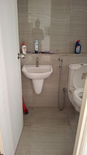 Bathroom in 1 BHK Apartment at Runwal Gardens, Dombivli East – for Rent