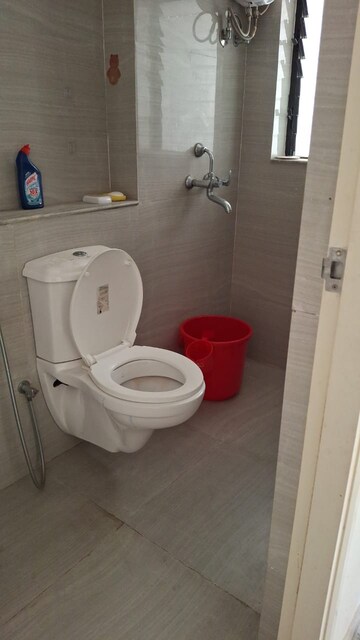 Bathroom in 1 BHK Apartment at Runwal Gardens, Dombivli East – for Rent