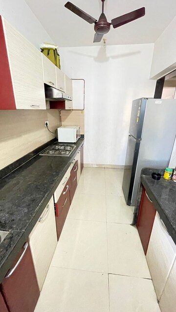 Kitchen in 3 BHK Apartment at Acme Ozone, Manpada – for Rent