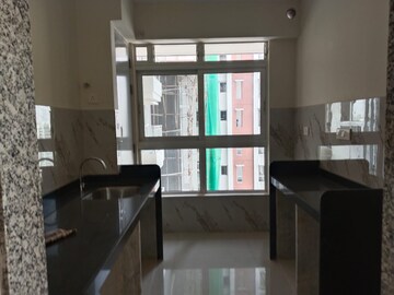 Kitchen in 2 BHK Apartment at Wadhwa TW Gardens, Kandivali East – for Rent