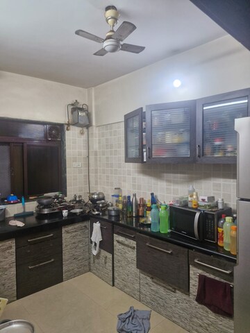 Living Room in 2 BHK Apartment at Pranay Nagar CHS, Borivali West – for Sale