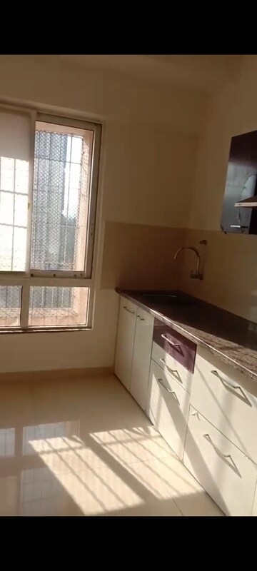 Kitchen in 2 BHK Apartment at Piramal Vaikunth Vairat, Balkum Pada – for Rent