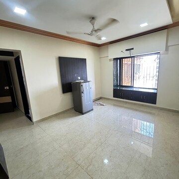 Living Room in 1 BHK Apartment at Prayag Heights, Dindoshi – for Rent