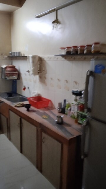 Kitchen in 2 BHK Apartment at Thackers Apartments, Camp – for Sale