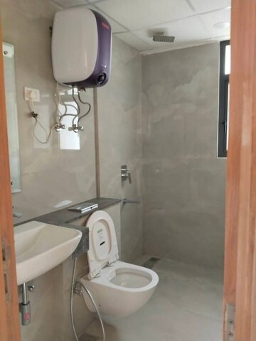Bathroom in 3 BHK Apartment at Shapoorji Pallonji Joyville Phase 3, Sector 102 – for Rent