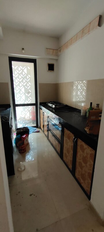 Kitchen in 2 BHK Apartment at Lodha Palava Crown, Dombivli East – for Sale
