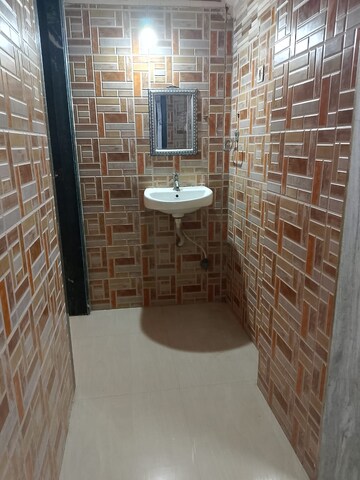 Bathroom in 2 BHK Apartment at Rajendra Vihar CHS, Malad West – for Rent