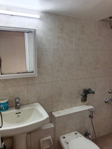 Bathroom in 2 BHK Apartment at K Raheja Palm Court, Malad West – for Rent