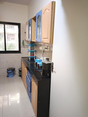 Kitchen in 2 BHK Apartment at K Raheja Palm Court, Malad West – for Rent