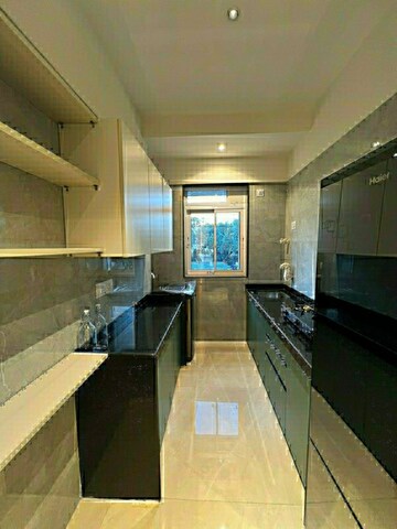 Kitchen in 3 BHK Apartment at K Hemani Ananda CHS, Mulund West – for Sale