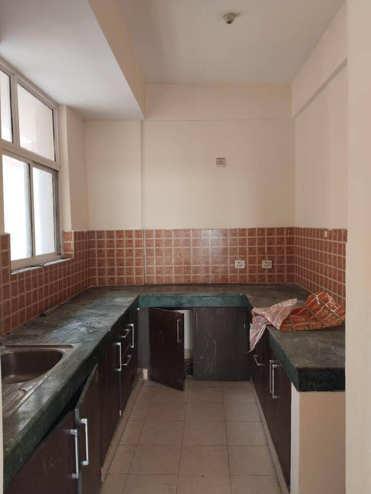 Kitchen, sushant golf city 3 Bedroom 1337 Sq.Ft. Apartment In Sushant Golf City Lucknow 8373839