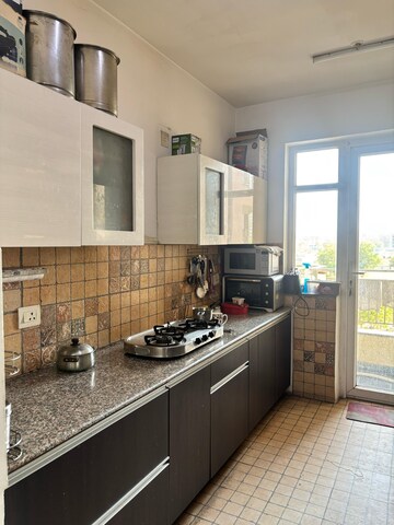 Kitchen in 3 BHK Apartment at Supertech Araville, Sector 79 – for Rent