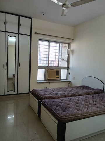 Bedroom in 2 BHK Apartment at Nilgiri Upvan CHS, Gawand Baug – for Rent