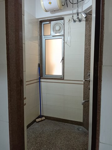 Bathroom in 2 BHK Apartment at Nilgiri Upvan CHS, Gawand Baug – for Rent