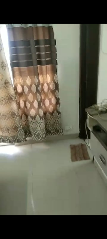 Living Room in 2 BHK Apartment at JKG Palm Resort, Raj Nagar Extension – for Rent