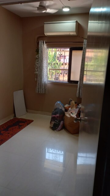 Living Room in 1 BHK Apartment at Nagari Niwara CHS, Goregaon East – for Rent