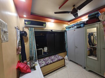 Bedroom in 1 BHK Apartment at Nagari Niwara CHS, Goregaon East – for Sale