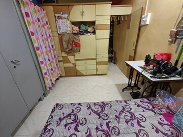 Bedroom in 1 BHK Apartment at Nagari Niwara CHS, Goregaon East – for Sale